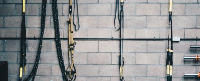 black and white rope on brown brick wall